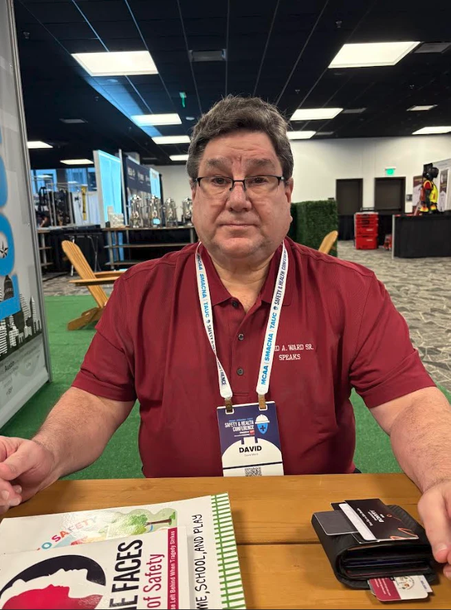David A. Ward Sr. portrait at a safety conference booth