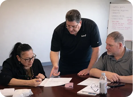 David working through a safety plan with a leadership team